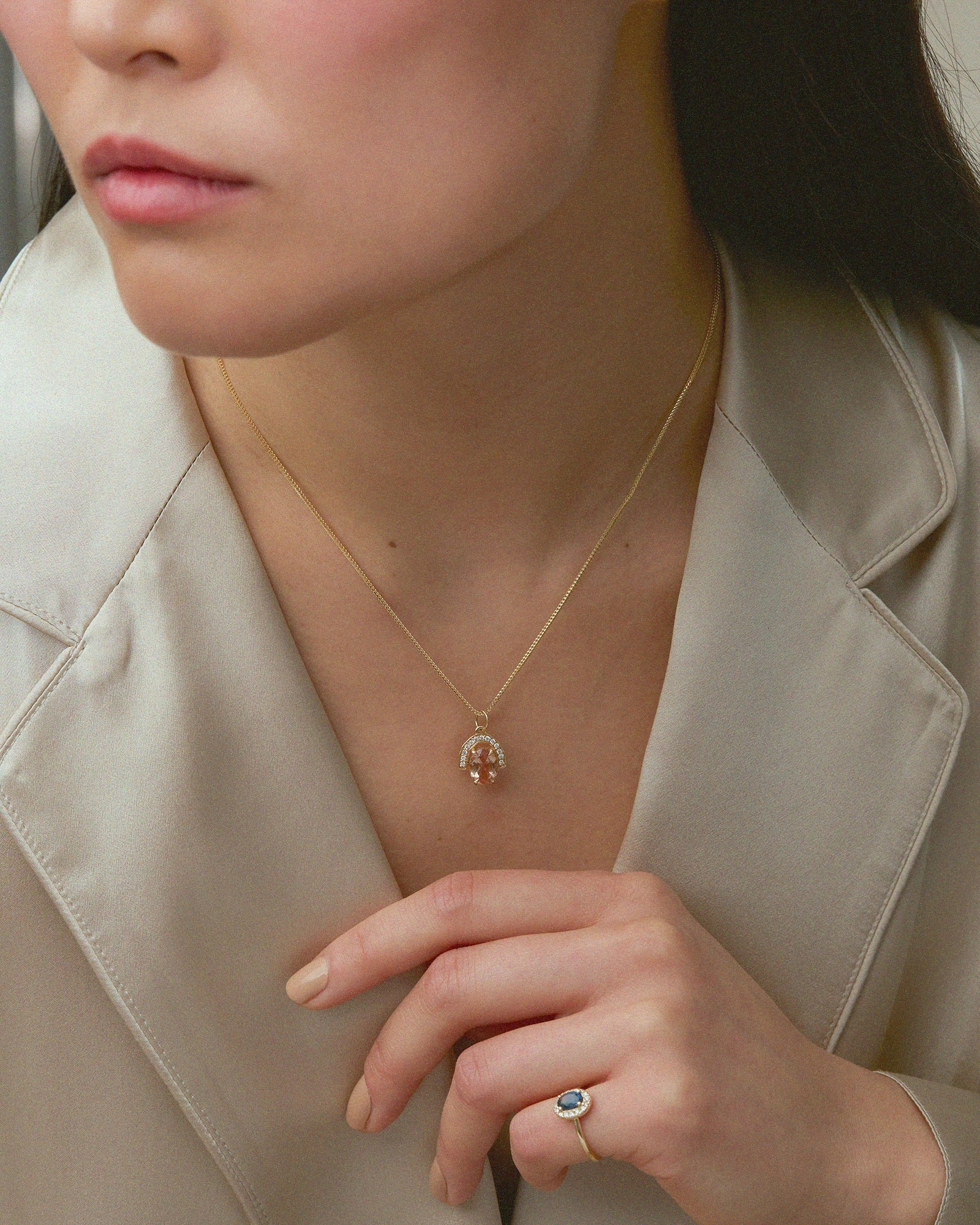 Oval Sunstone Pendant in Fairmined 14K Yellow Gold adorned with lab-grown diamonds